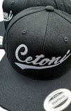 Snapback Cap - Cetoni Motorsport Schwarz Weiß / Unisex Caps